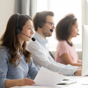 Call center team discussing insurance tactics affecting personal injury claims in Los Angeles, CA.